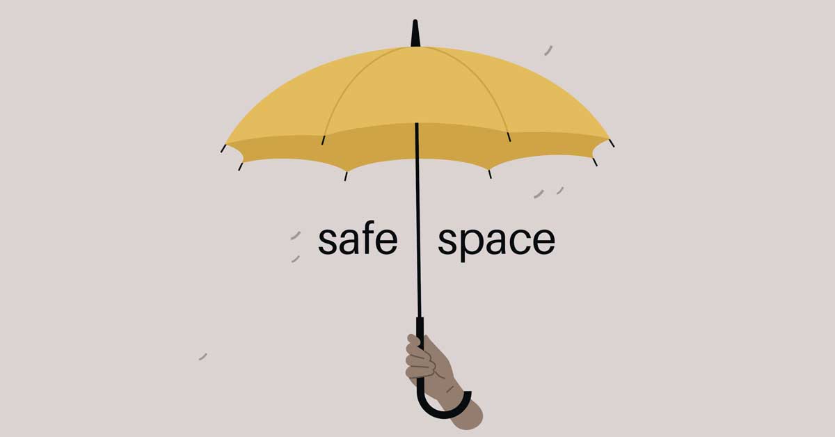 Yellow Umbrella held over the words Safe Space