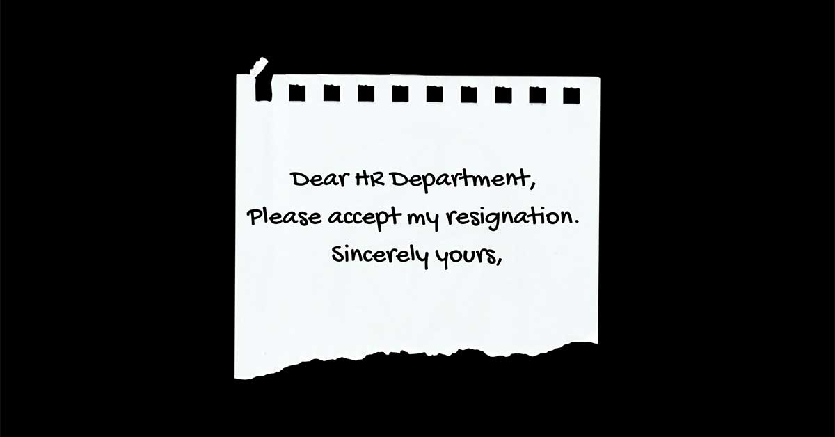 Torn paper saying "Dear HR Department Please accept my resignation. Sincerely yours."